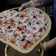 Illustration for article titled Two Colorado pizzerias help each other out during a COVID scare